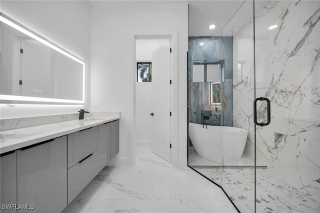 4026 SE 3rd Ave, Cape Coral, FL 33904 - full bathroom featuring a freestanding tub, vanity, marble finish floor, a marble finish shower, and recessed lighting