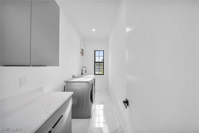 4026 SE 3rd Ave, Cape Coral, FL 33904 - laundry room featuring marble finish floor, recessed lighting, separate washer and dryer, a sink, and cabinet space