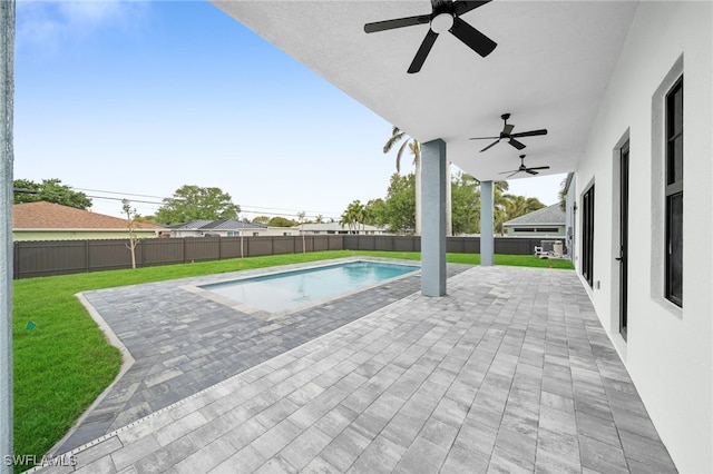 4026 SE 3rd Ave, Cape Coral, FL 33904 - view of pool featuring a fenced backyard, a patio, ceiling fan, and a yard