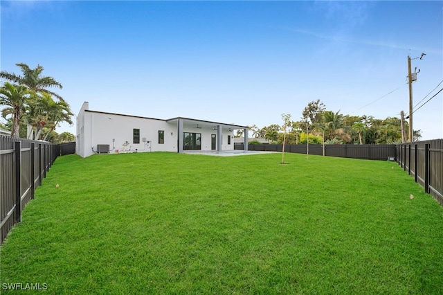 4026 SE 3rd Ave, Cape Coral, FL 33904 - view of yard with a fenced backyard and a patio area