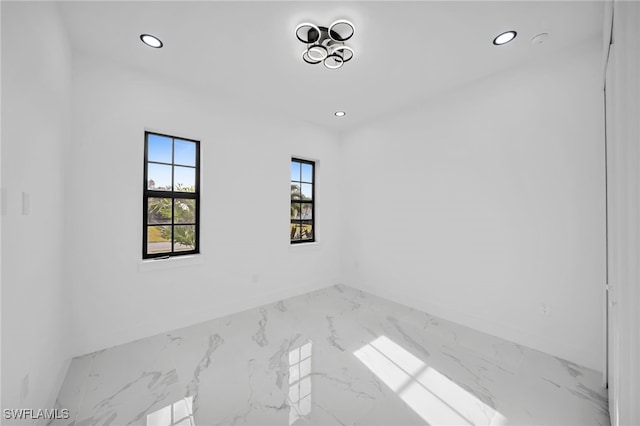 4026 SE 3rd Ave, Cape Coral, FL 33904 - unfurnished room with recessed lighting, marble finish floor, and baseboards