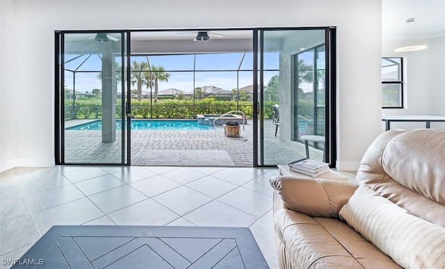 living room featuring tile patterned floors and a wealth of natural light