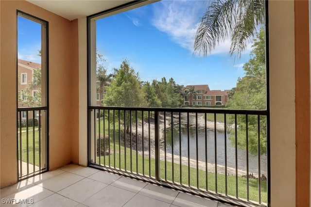 balcony featuring a water view