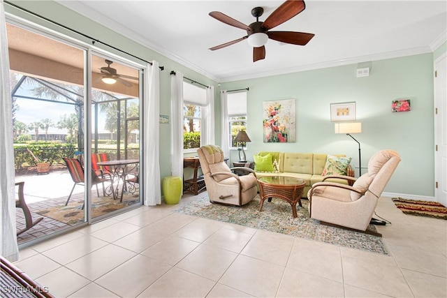 sunroom featuring an outdoor living space and a ceiling fan