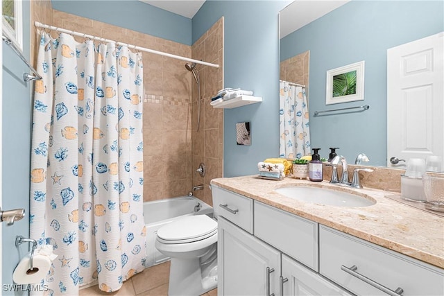 full bathroom featuring shower / bath combination with curtain, toilet, tile patterned flooring, and vanity