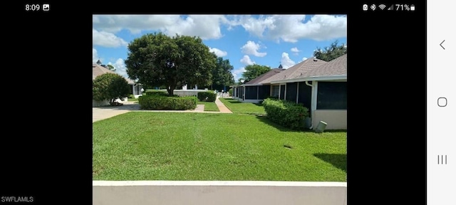 321 Dania St, Lehigh Acres, FL 33936 - view of green lawn