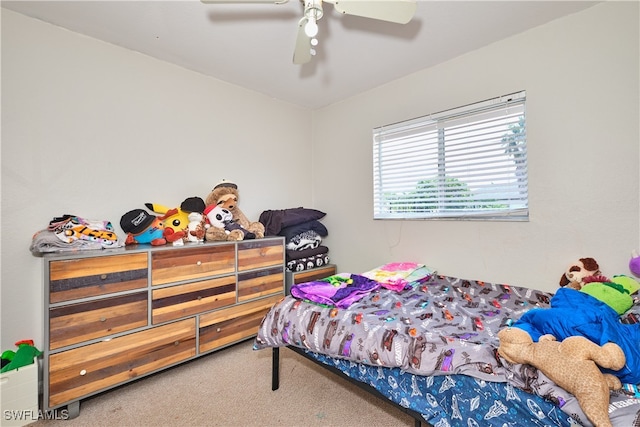 carpeted bedroom with a ceiling fan