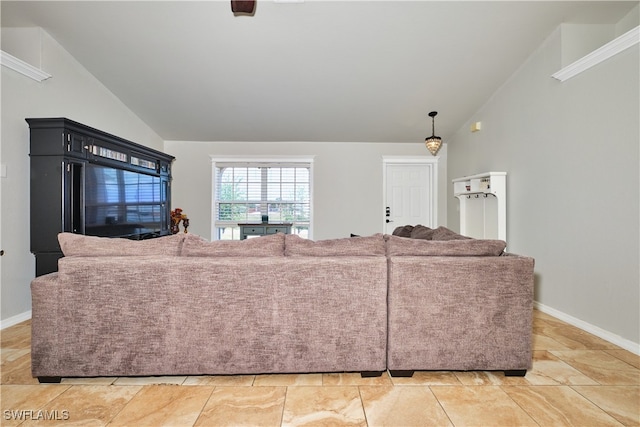 living room with high vaulted ceiling and baseboards