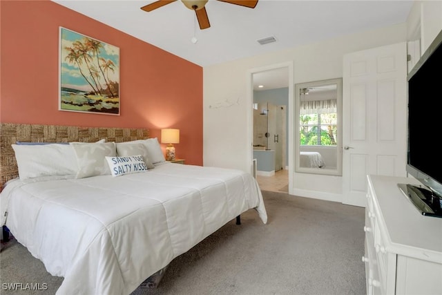 20263 Cypress Shadows Blvd, Estero, FL 33928 - bedroom with ceiling fan, ensuite bath, visible vents, and carpet