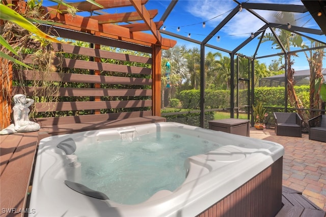 20263 Cypress Shadows Blvd, Estero, FL 33928 - view of patio / terrace with a hot tub, a pergola, and a lanai