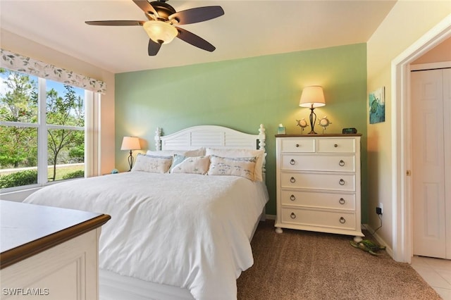 11019 Mill Creek Way Unit 903, Fort Myers, FL 33913 - bedroom with baseboards and a ceiling fan