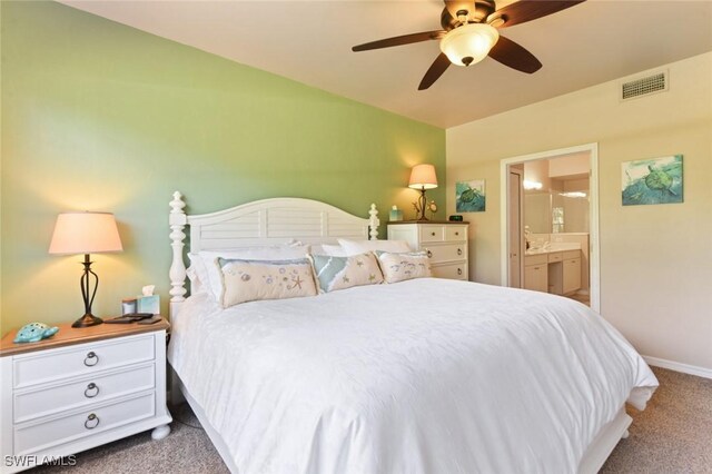 11019 Mill Creek Way Unit 903, Fort Myers, FL 33913 - bedroom with visible vents, vaulted ceiling, carpet floors, baseboards, and connected bathroom