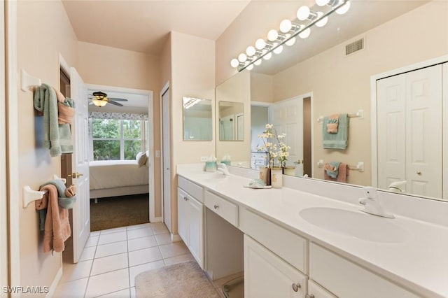 11019 Mill Creek Way Unit 903, Fort Myers, FL 33913 - ensuite bathroom with ensuite bath, vanity, tile patterned floors, a ceiling fan, and visible vents