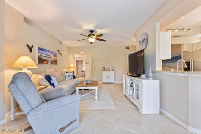 11019 Mill Creek Way Unit 903, Fort Myers, FL 33913 - living room featuring a ceiling fan, baseboards, visible vents, and light tile patterned floors