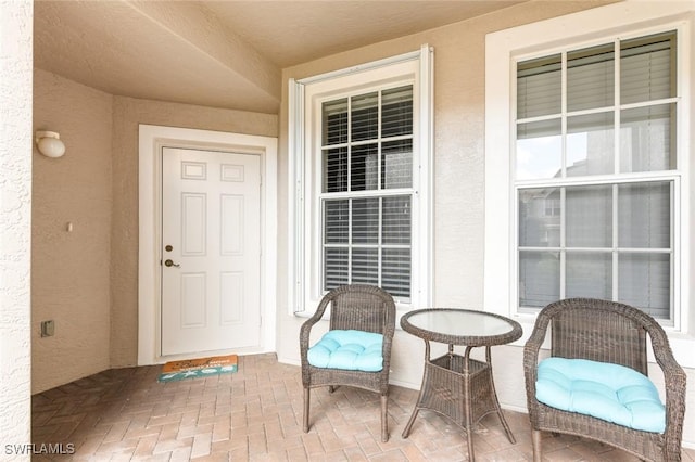 11019 Mill Creek Way Unit 903, Fort Myers, FL 33913 - doorway to property featuring stucco siding