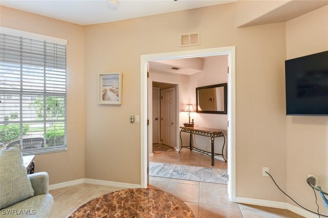 11019 Mill Creek Way Unit 903, Fort Myers, FL 33913 - interior space featuring baseboards, light tile patterned flooring, and visible vents
