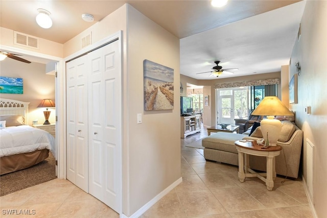 11019 Mill Creek Way Unit 903, Fort Myers, FL 33913 - hallway featuring baseboards, light tile patterned flooring, and visible vents