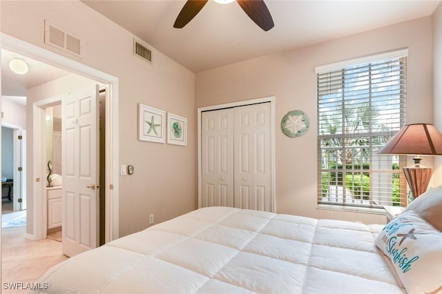 11019 Mill Creek Way Unit 903, Fort Myers, FL 33913 - tiled bedroom with visible vents, a ceiling fan, and a closet