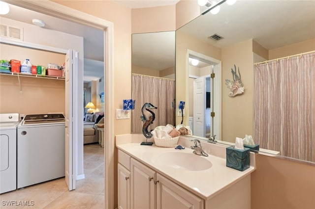 11019 Mill Creek Way Unit 903, Fort Myers, FL 33913 - full bathroom with vanity, tile patterned flooring, independent washer and dryer, and visible vents