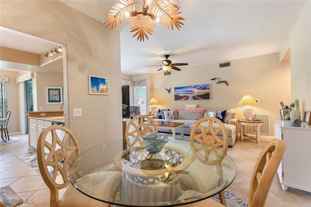 11019 Mill Creek Way Unit 903, Fort Myers, FL 33913 - dining room featuring light tile patterned floors, ceiling fan with notable chandelier, and visible vents
