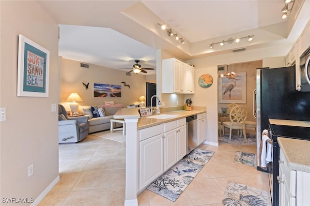 11019 Mill Creek Way Unit 903, Fort Myers, FL 33913 - kitchen with appliances with stainless steel finishes, a sink, light countertops, open floor plan, and light tile patterned floors