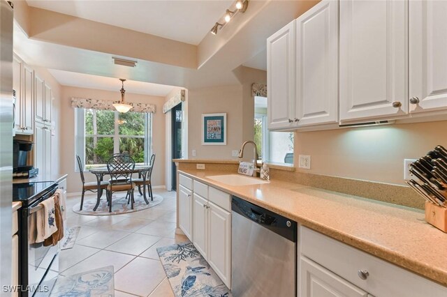 11019 Mill Creek Way Unit 903, Fort Myers, FL 33913 - kitchen with a sink, electric stove, white cabinets, and dishwasher
