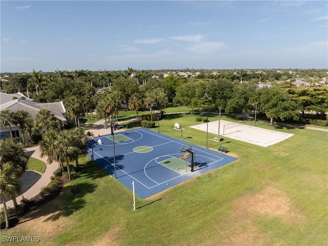 view of basketball court featuring a yard, community basketball court, and volleyball court