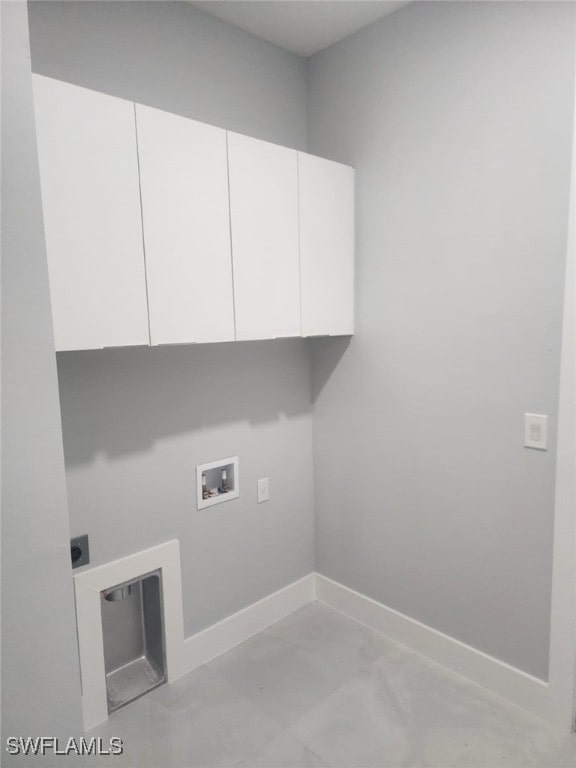 laundry room featuring baseboards, cabinet space, washer hookup, and hookup for an electric dryer