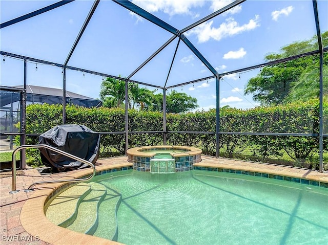 2846 Via Piazza Loop, Fort Myers, FL 33905 - view of swimming pool with a pool with connected hot tub, a lanai, a patio area, and a grill