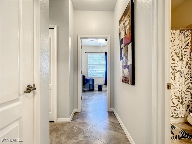 2846 Via Piazza Loop, Fort Myers, FL 33905 - hallway with baseboards and marble finish floor