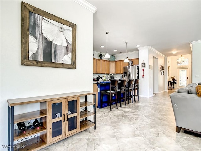 2846 Via Piazza Loop, Fort Myers, FL 33905 - living room featuring baseboards, ornamental molding, a notable chandelier, and recessed lighting