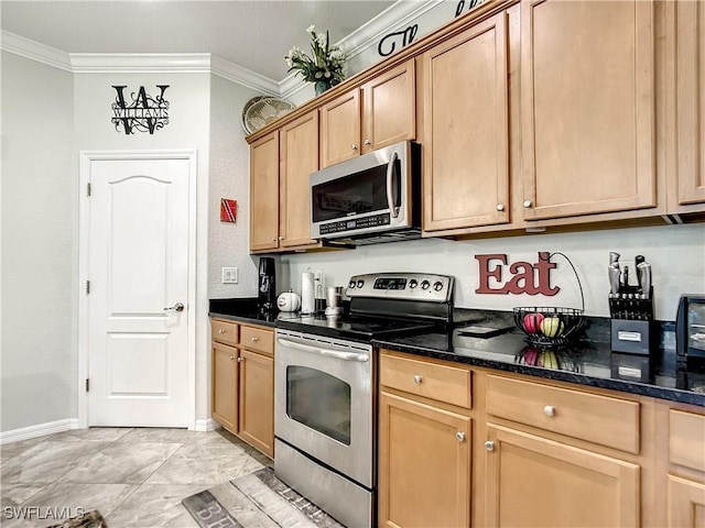 2846 Via Piazza Loop, Fort Myers, FL 33905 - kitchen featuring appliances with stainless steel finishes, ornamental molding, baseboards, and dark stone countertops