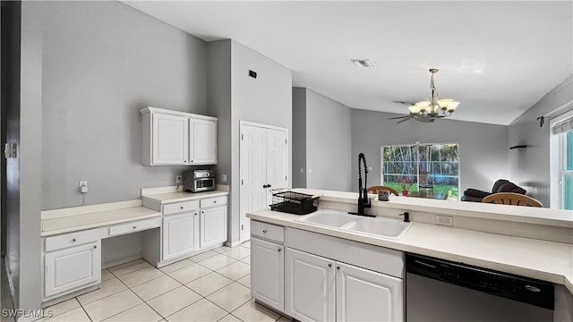 17942 Oakmont Ridge Cir, Fort Myers, FL 33967 - kitchen with dishwasher, a sink, a chandelier, light tile patterned floors, and vaulted ceiling