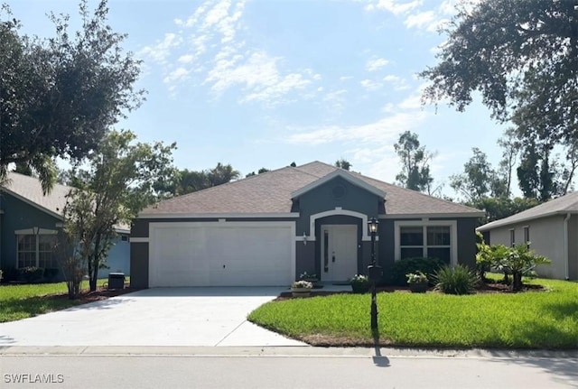 17942 Oakmont Ridge Cir, Fort Myers, FL 33967 - ranch-style home with a garage, concrete driveway, a front yard, and stucco siding