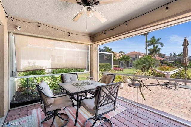 exterior space featuring a ceiling fan and outdoor dining space