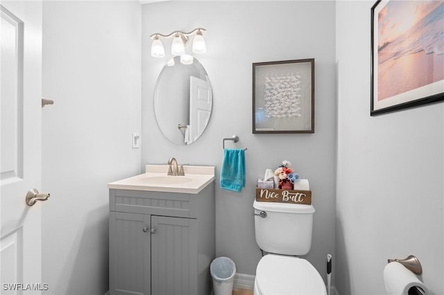 half bath with toilet and vanity