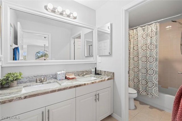 bathroom featuring toilet, shower / tub combo with curtain, double vanity, and a sink