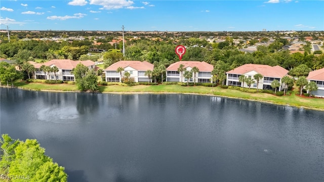 bird's eye view featuring a water view and a residential view