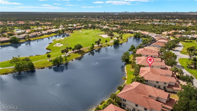 bird's eye view with a residential view, view of golf course, and a water view