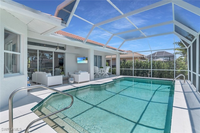 931 Snowberry Ct, Marco Island, FL 34145 - pool with ceiling fan, a patio area, a lanai, and an outdoor hangout area