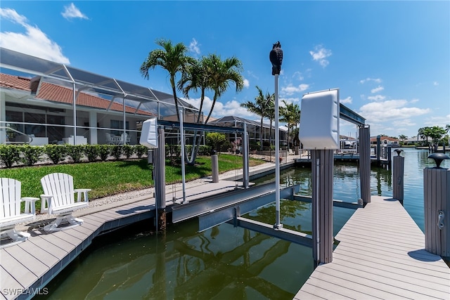 931 Snowberry Ct, Marco Island, FL 34145 - dock area featuring a water view, a yard, and boat lift