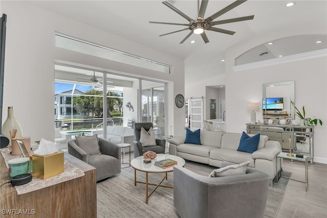 931 Snowberry Ct, Marco Island, FL 34145 - living room with light wood-style floors, baseboards, ceiling fan, and recessed lighting