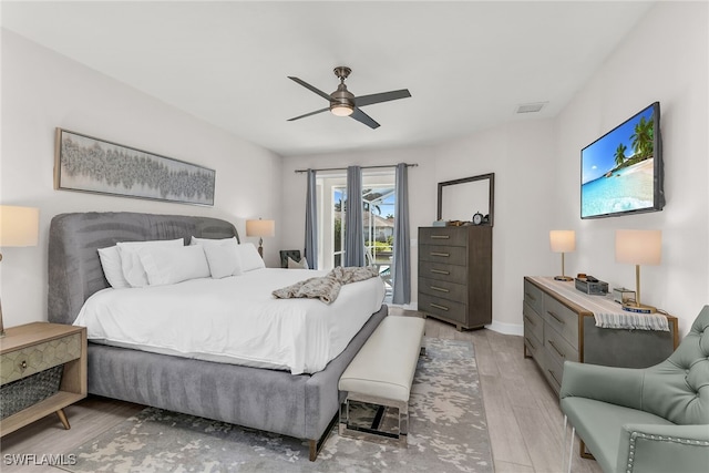 931 Snowberry Ct, Marco Island, FL 34145 - bedroom with a ceiling fan, access to exterior, visible vents, light wood-type flooring, and baseboards