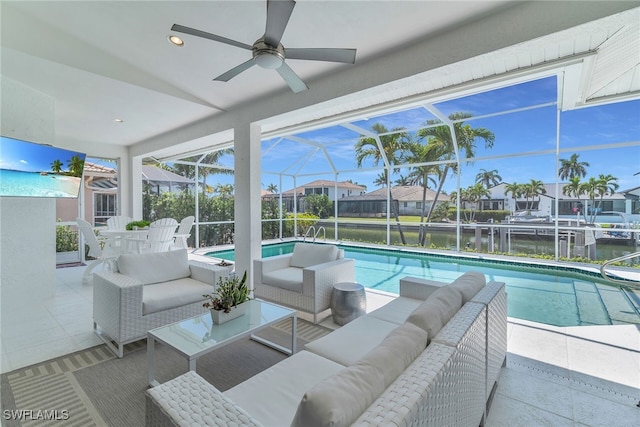931 Snowberry Ct, Marco Island, FL 34145 - outdoor pool with a patio, ceiling fan, a lanai, and an outdoor hangout area
