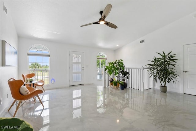 interior space with ceiling fan, visible vents, baseboards, and marble finish floor