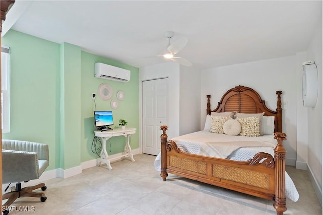 bedroom featuring baseboards, ceiling fan, and a wall unit AC
