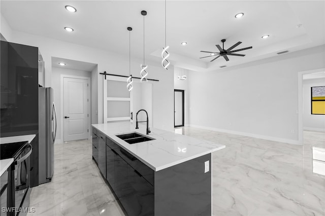kitchen featuring a sink, freestanding refrigerator, recessed lighting, black range with electric cooktop, and modern cabinets