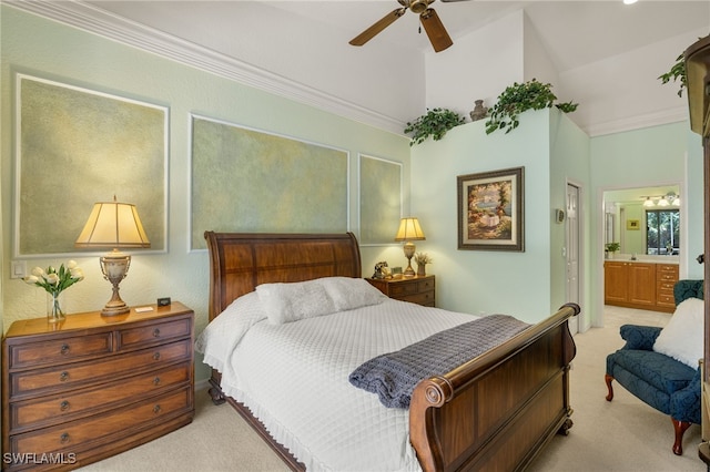 bedroom featuring connected bathroom, ceiling fan, light colored carpet, vaulted ceiling, and ornamental molding