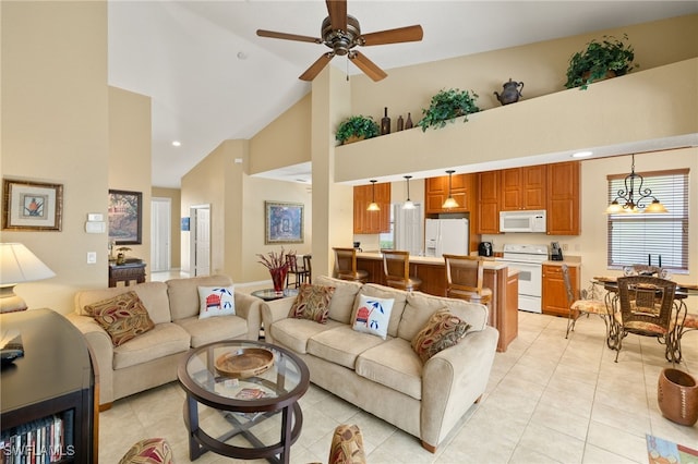 living room featuring light tile patterned floors, high vaulted ceiling, ceiling fan, and recessed lighting
