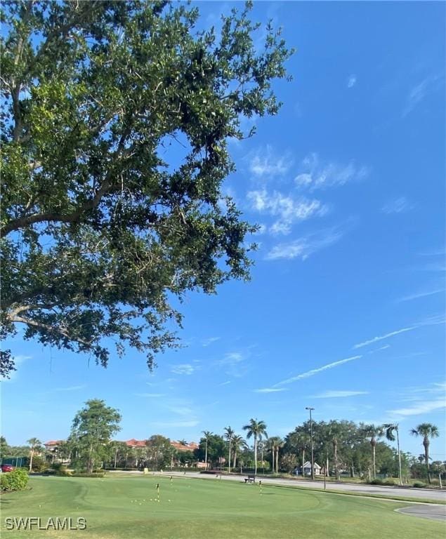 view of property's community with view of golf course